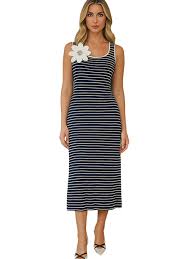 Robe Orly 261322 : rayures noir et blanc classiques, sans manches, longueur midi. Parfaite pour été et occasions. Style intemporel et féminin.