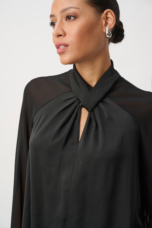 Top Chiffon Noir Col Torsadé Keyhole Manches Longues Joseph Ribkoff 264119 — Pour la femme au style sophistiqué et affirmé, portez-le en soirée avec un pantalon épuré, en cocktail avec un pantalon wide leg, ou au bureau avec un pantalon droit premium