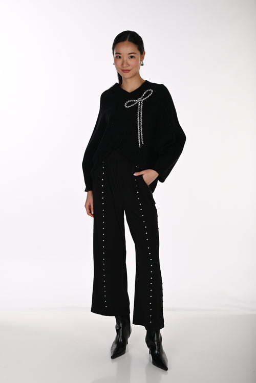 Pantalon Large Raccourci à Ornements Argentés Noir Frank Lyman 264834 — Pour la femme au style affirmé, parce que ses lignes ponctuées d’éclat signent la silhouette, au bureau avec une blouse ivoire ou en soirée avec un haut noir