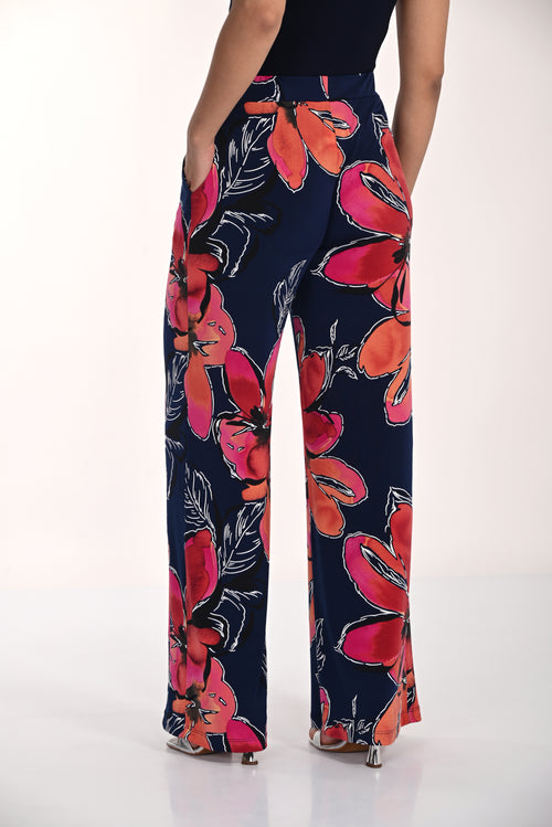 Pantalon Frank Lyman à jambe large avec imprimé floral multicolore sur fond foncé, conçu pour un style affirmé et élégant – Modèle 266357
