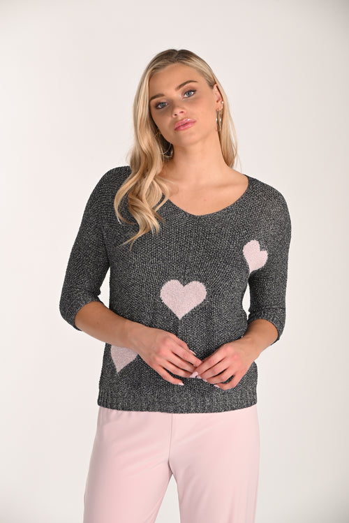 Découvrez le haut Frank Lyman 266548 pour femme. Imprimé cœurs romantique avec détails contrastants. Manches longues élégantes. Style féminin et chic.