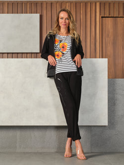 Haut Tricotto 56184 rayé blanc et noir avec motif floral jaune et orange pour femme – Manches courtes, style coloré et estival