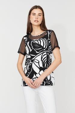 Haut à imprimé feuilles tropicales noir et blanc à manches en maille transparente – 36012 – Un haut moderne et sophistiqué pour une allure chic et audacieuse – Compli K