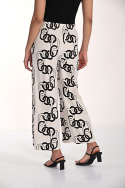 Pantalon blanc et noir à imprimé graphique Frank Lyman 266212 – Style moderne et élégance contrasée pour la femme contemporaine, du bureau aux sorties chic